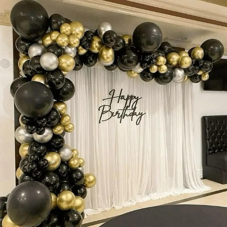 Black and gold birthday balloon arch
