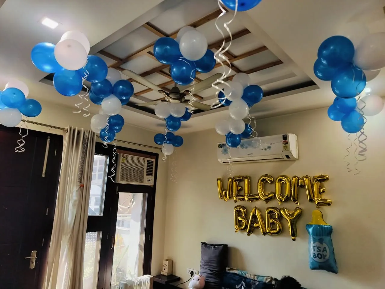 Blue and white newborn welcome balloon decorations