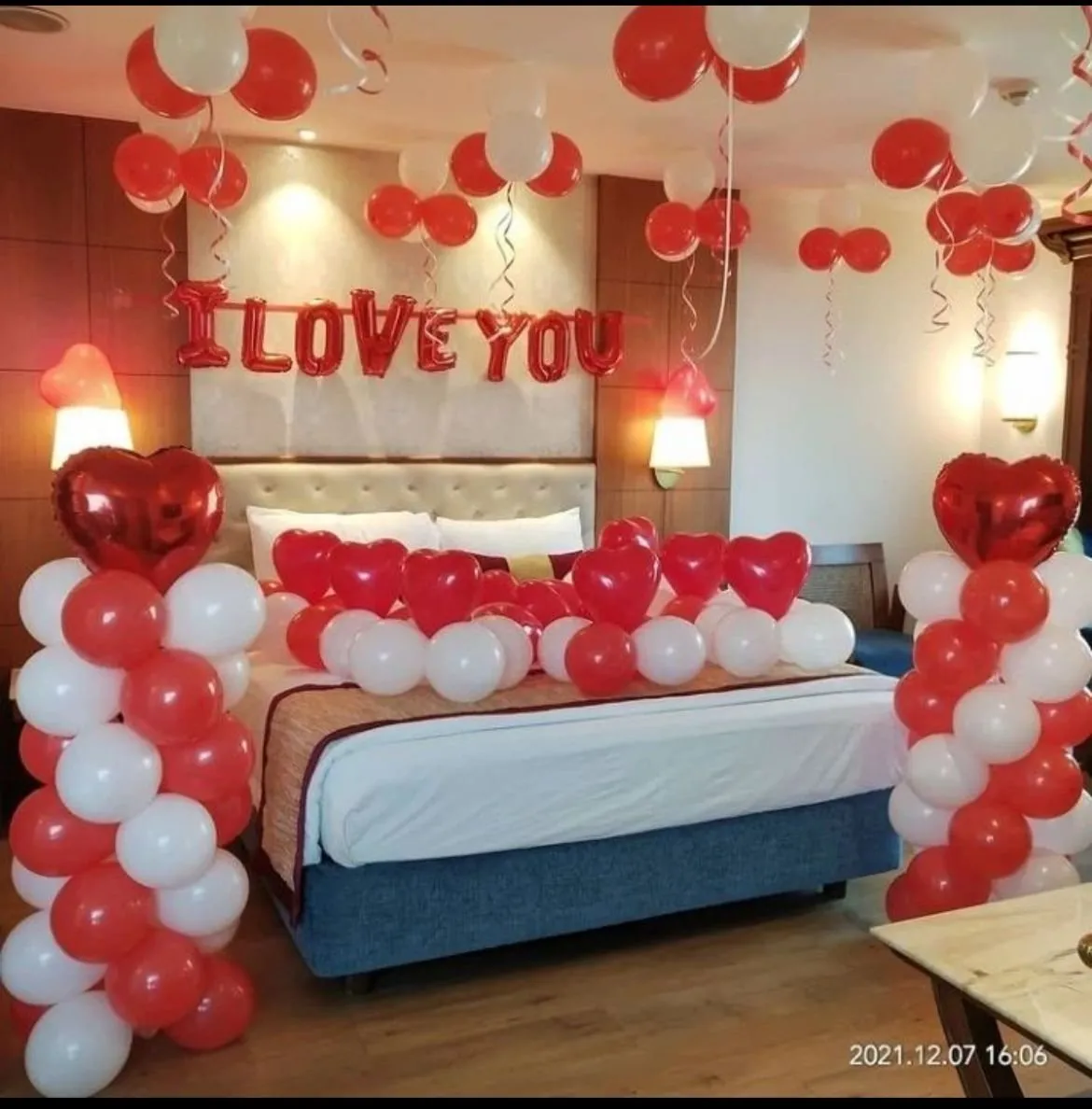 Romantic red and white room decoration with balloons